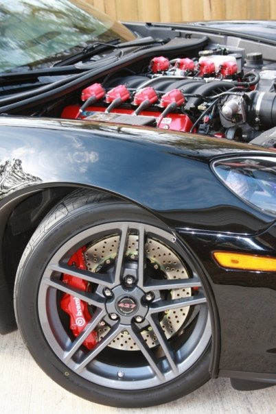 red brembo brake callipers and engine